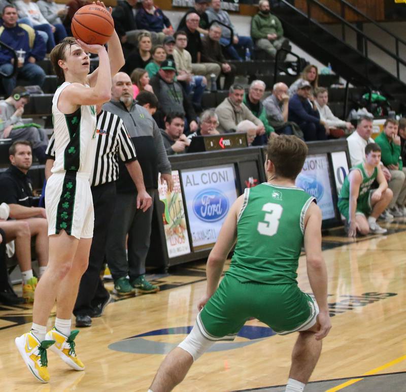 Seneca's Braden Ellis shoots a three-point basket over Dwight's Connor Telford during the Tri-County Conference Tournament on Wednesday, Jan. 25, 2023 at Putnam County High School.