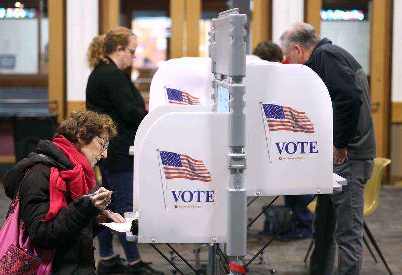 Voters cast their ballots Tuesday, April 1, 2025, in the polling place at the Westminster Presbyterian Church in DeKalb.