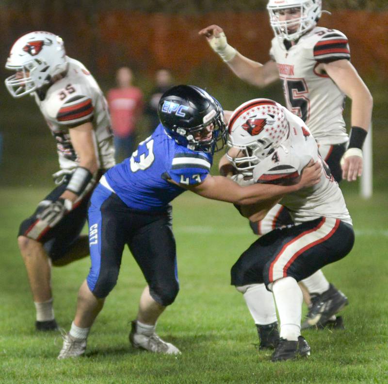 Eastland-Pearl City's Lucas Bremmer (43) tackles Forreston's Christian Riya (4) during Friday, Oct. 3, 2025 action at Pearl City High School.