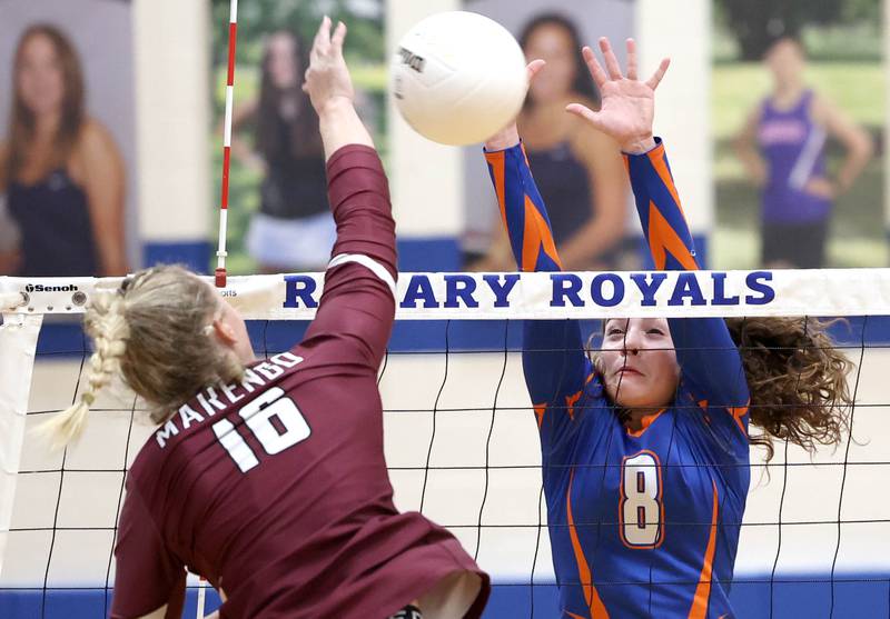 Genoa-Kingston's Alivia Keegan tries to block Marengo's Mia Lulinski Thursday, Oct. 27, 2022, during their Class 2A Regional final match at Rosary High School in Aurora.