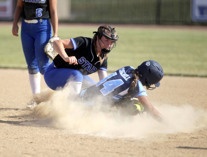 St. Charles North’s Margo Geary gets Lake Park’s Ari O’Connell out at second base during the Class 4A St. Charles North Sectional final against St. Charles North on Friday, June 2, 2023.