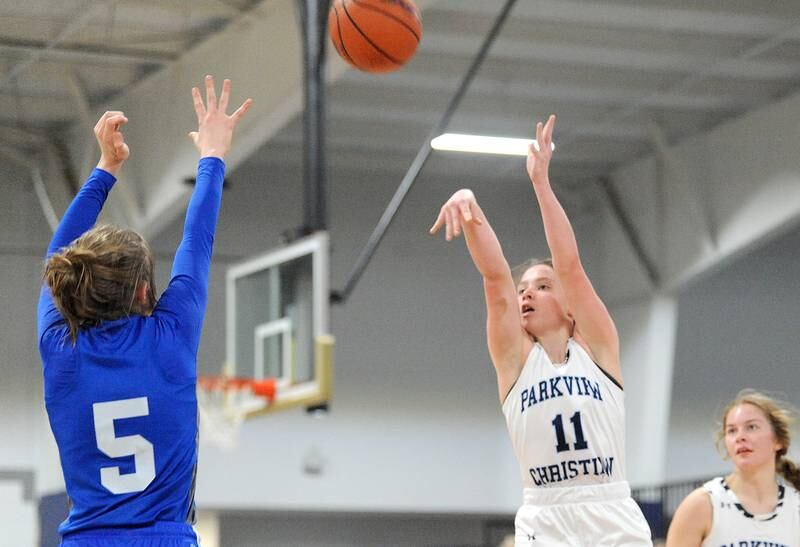 Parkview Christian's Gracie Lambes (11) shoots and drains a three-point shot over Westlake Christian defender Juliet Sigurnjak (5) during a girls' basketball game at Parkview Christian Academy on Tuesday, Dec. 20, 2022.