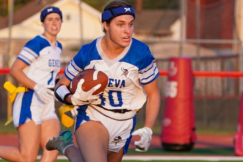 Geneva’s Tegan Modjeski (40) runs after the catch against Yorkville during a non-conference game at Yorkville High School on Tuesday, Sept. 2, 2025.
