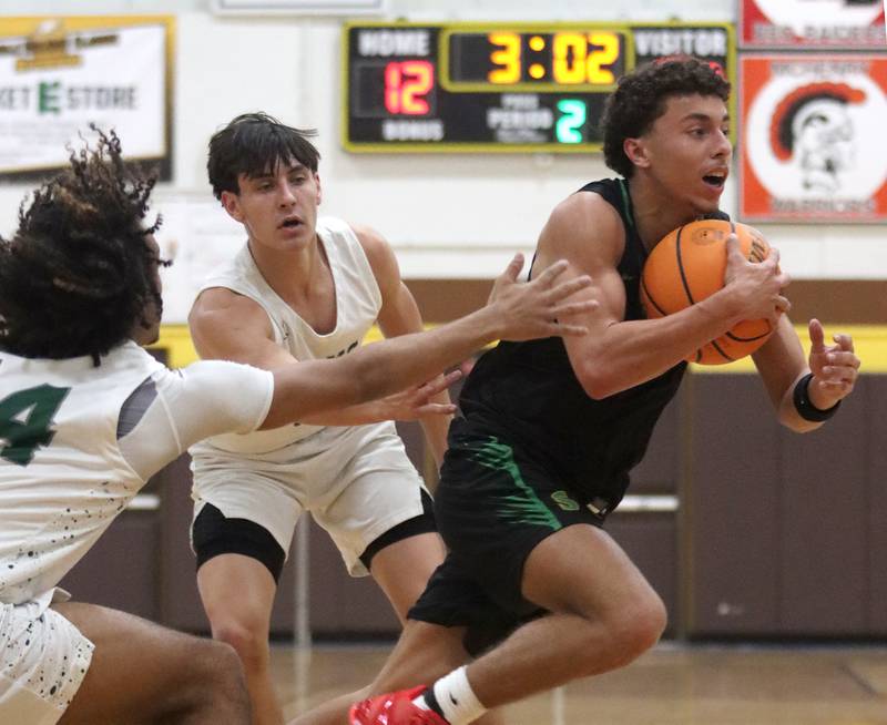Crystal Lake South’s AJ Demirov moves the ball against Grayslake Central during Hinkle Holiday Classic varsity boys basketball tournament action on Thursday, Dec. 26, 2024 at Jacobs High School in Algonquin.