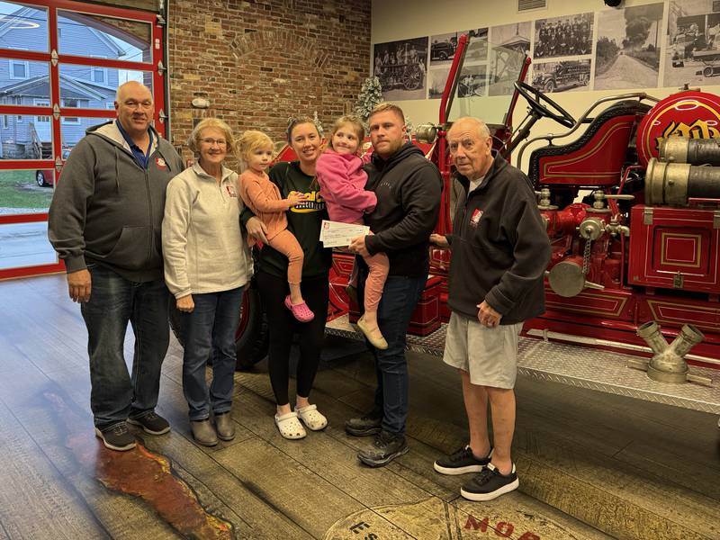 (From left-to-right) Brad Baker, Kathy Lambros, Skyla, Megan, Celia and Andrew Tabler, and Joe Schmitz.