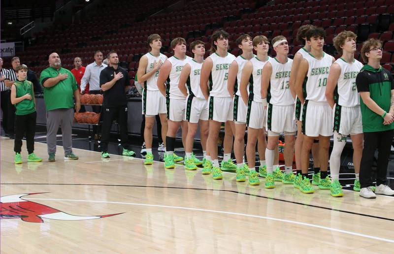 Seneca basketball players stand for the National Anthem before playing Streator during a game on Tuesday, Dec. 21, 2023 at the United Center in Chicago.