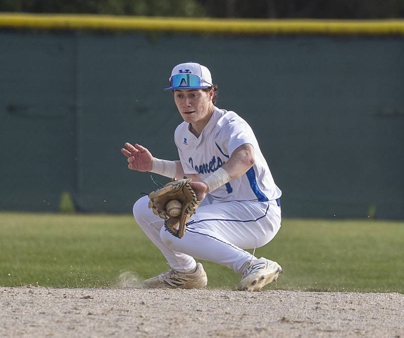 Newman’s Garret Matznick handles a grounder at shortstop for an out against Princeton Thursday, April 10, 2025.