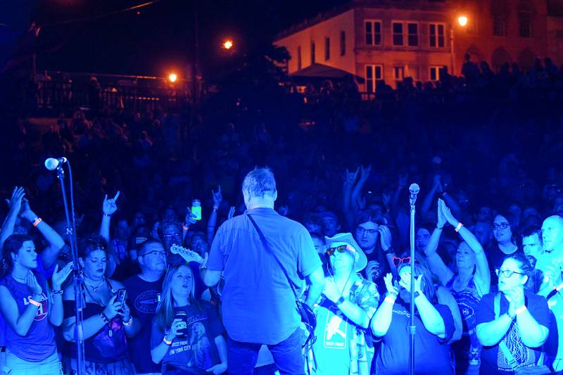 Fans fill the lawn at the Hill Stage as Local H's Scott Lucas plays a guitar solo July 28, 2024, at Merchant Street MusicFest in downtown Kankakee.