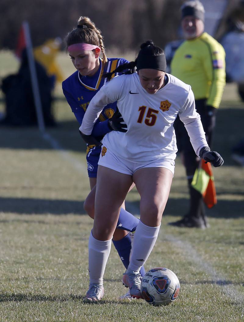 Richmond-Burton’s Brianna Maldonado tries to control the ball in front of Johnsburg’s Aliyah Anderson during a Kishwaukee River Conference soccer game on Wednesday, March 20, 2024, at Johnsburg High School.