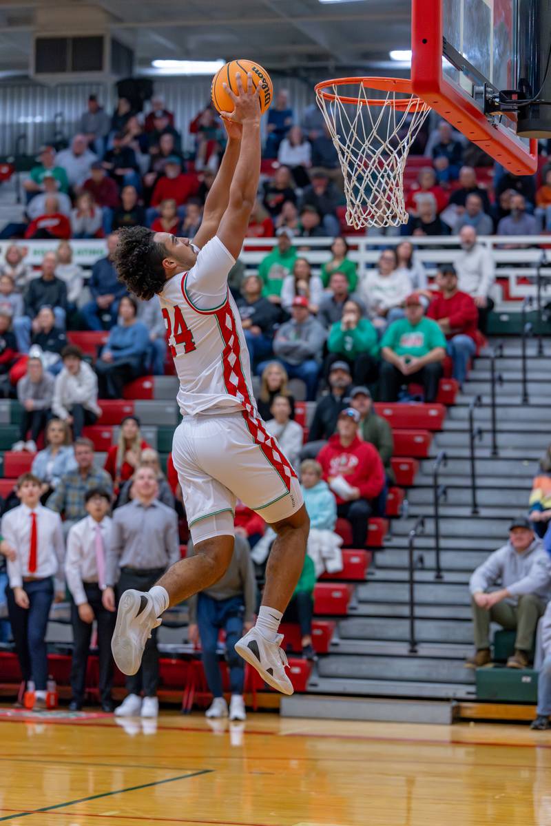 Marion Persich of LaSalle-Peru High School dunks the ball during the game against Hall at Sellett Gymnasium on December 2, 2025 at LP High School.