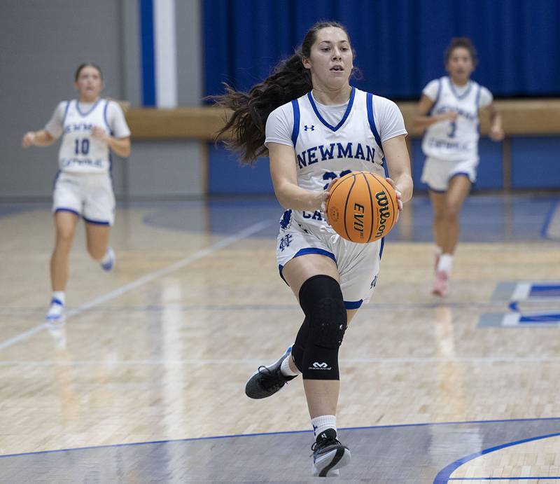 Newman’s Anna Propheter drives to the hoop against Fulton Tuesday, Nov. 25, 2025.