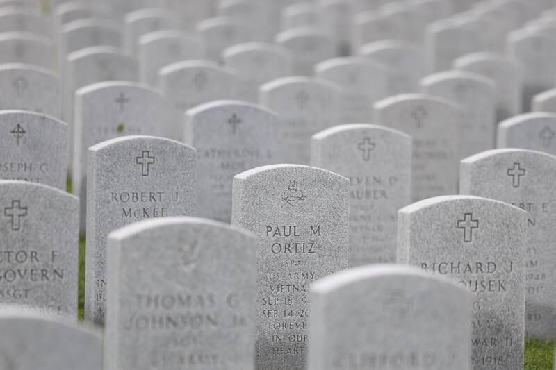 Headstones of members of the armed forces line the grounds at the Abraham Lincoln National Cemetery in Elwood on Saturday, July 29.