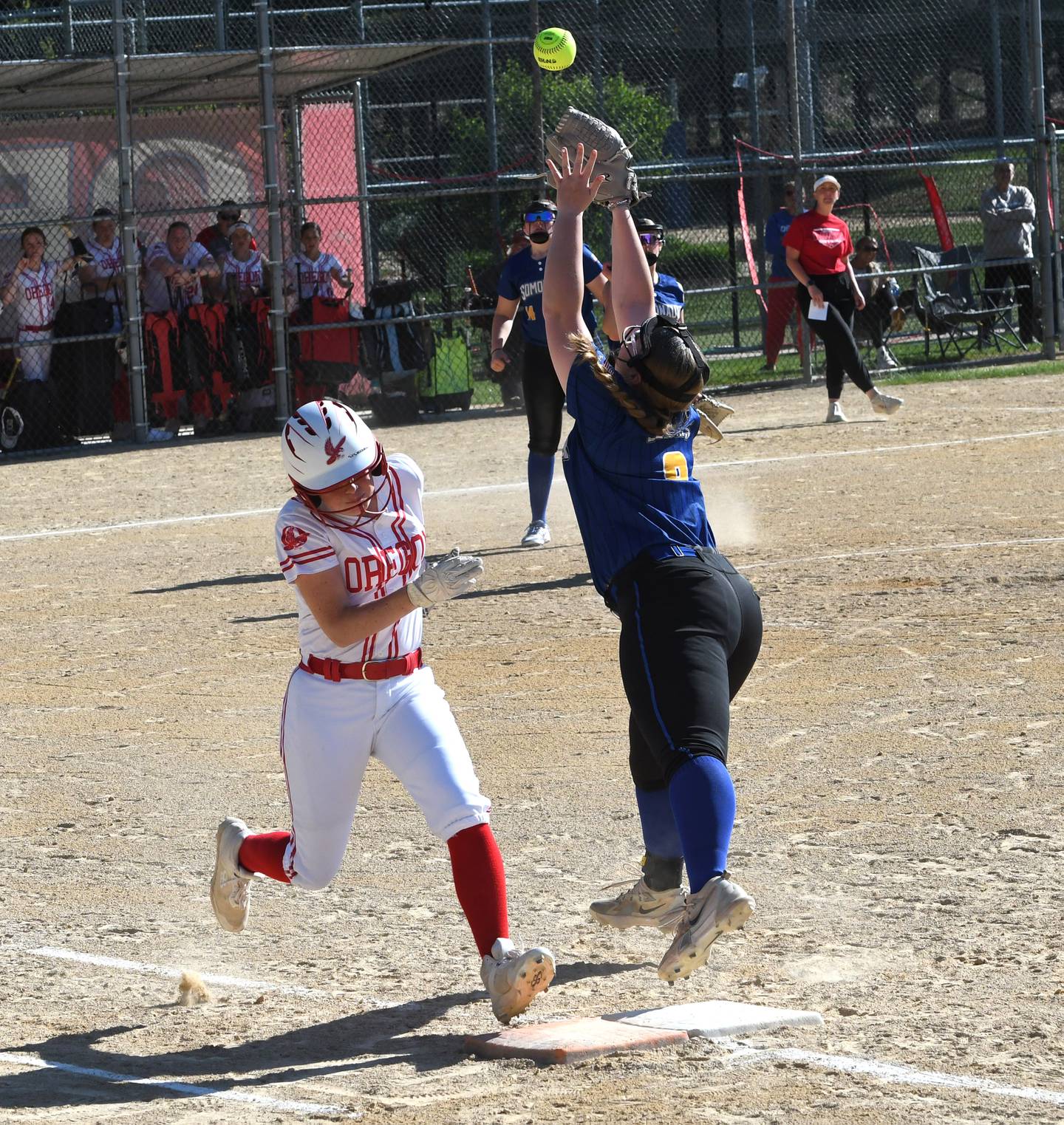 Oregon's Avery Young beats the throw as Somonauk first baseman Kammy Ambler reaches for the ball at the 2A Oregon Regional on Wednesday, May 20, 2026.