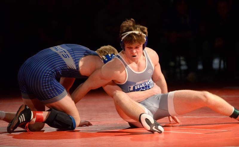 Sterling Newman’s Danny Kelly and Princeton’s Casey Etheridge wrestle at 165 pounds at the 1A Oregon Regional on Saturday, Feb. 15, 2025.