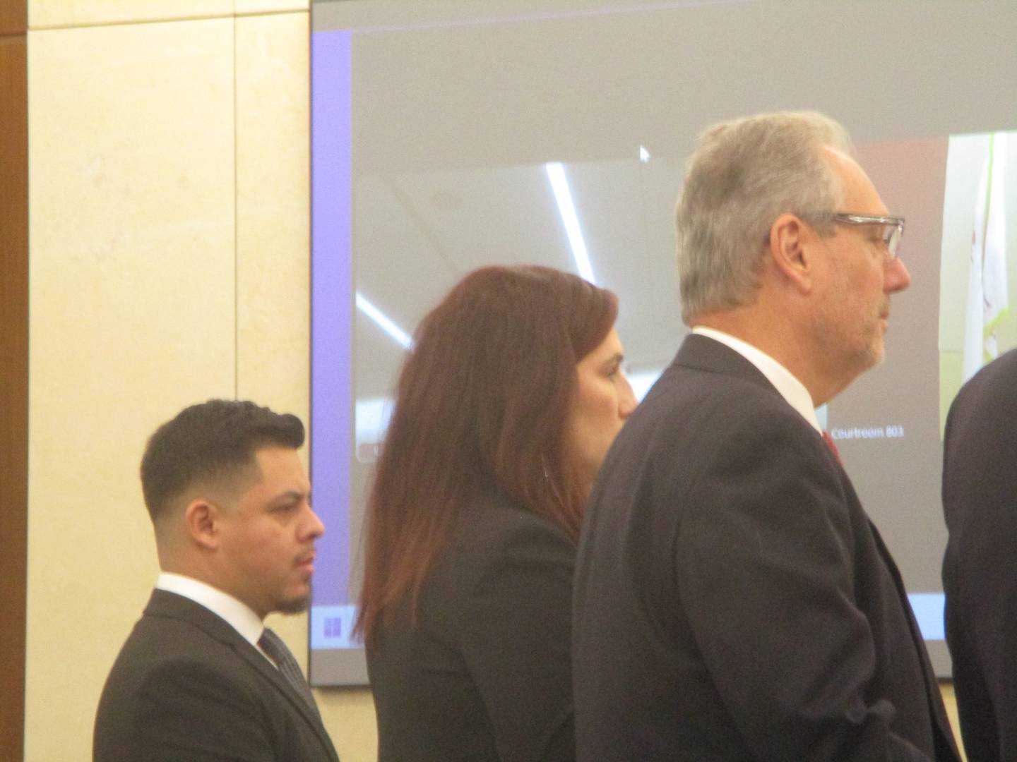 Joliet Councilman Juan Moreno (left) is flanked by his attorneys Anna Bertani and Frank Andreano on Thursday during a hearing on the case challenging his legitimacy to hold office. Dec. 4, 2025