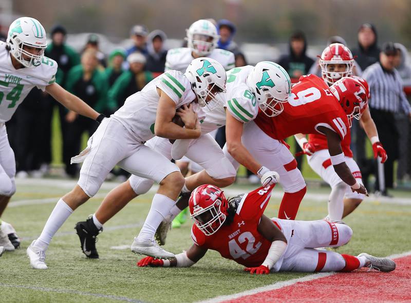 York's Matt Vezza (9) runs for the game winning score during a second round Class 8A varsity football playoff game between York High School and Marist High School on Saturday, Nov. 5, 2022 in Chicago, IL.