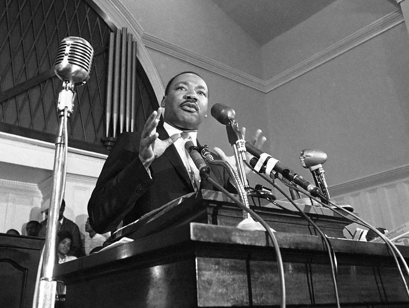 FILE - In this 1960 file photo, Rev. Martin Luther King Jr. speaks in Atlanta. The estate of the Rev. Martin Luther King Jr. has reached an agreement with HarperCollins Publishers for rights to his archive. HarperCollins released King's first book more than 60 years ago. The King Estate had been publishing books since 2009 with the Beacon Press.  (AP Photo, File)