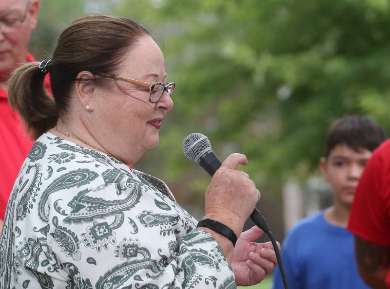 Pastor Karen Karczewski, of DePue First Congregational United Church of Christ gives the invocation during The US Title Series (USTS) Pro National Championship Boat Races on Friday, July 25, 2025 in DePue.