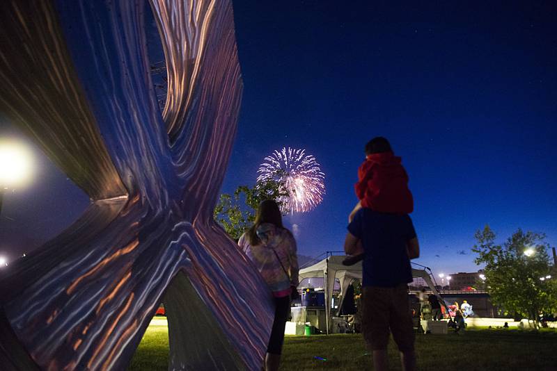 Revelers watch the Jaycees fireworks show Friday, July 1, 2022 from RB&W Park in Rock Falls.