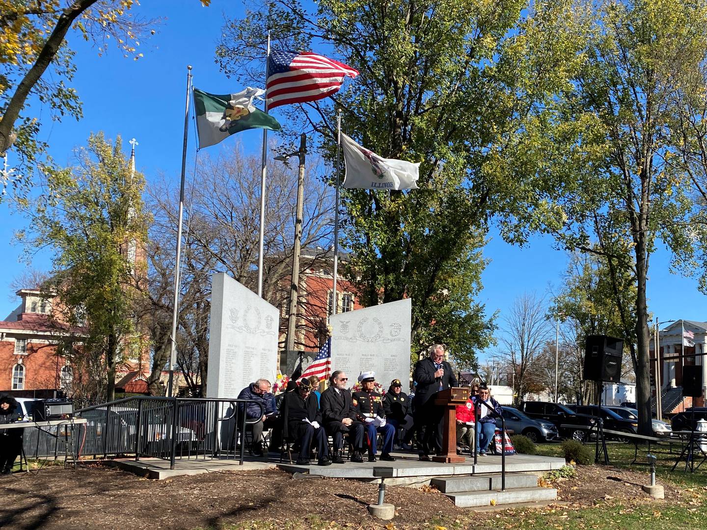 Mayor Dan Aussem addresses the crowd during the Veterans Day ceremony at Washington Square Park.