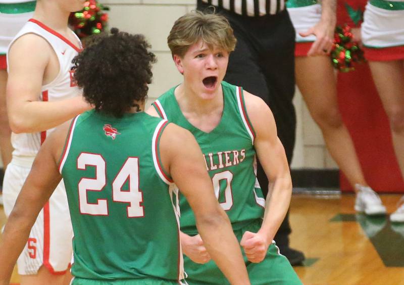 L-P's Braylin Bond reacts with teammate Marion Persich after making a shot an getting a foul against Streator during the Class 3A Regional title game on Friday, Feb. 28, 2025 in Sellett Gymnasium at L-P High School.