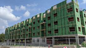 Construction of 2nd building at Oswego luxury apartments making quick progress