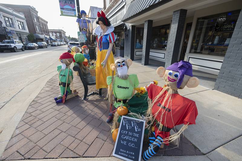 The Rock River Garden Club set up a Snow White themed scarecrow Thursday, Oct. 16, 2025, ahead of this weekend’s Scarecrow Fest and Witches Night Out on Thursday.