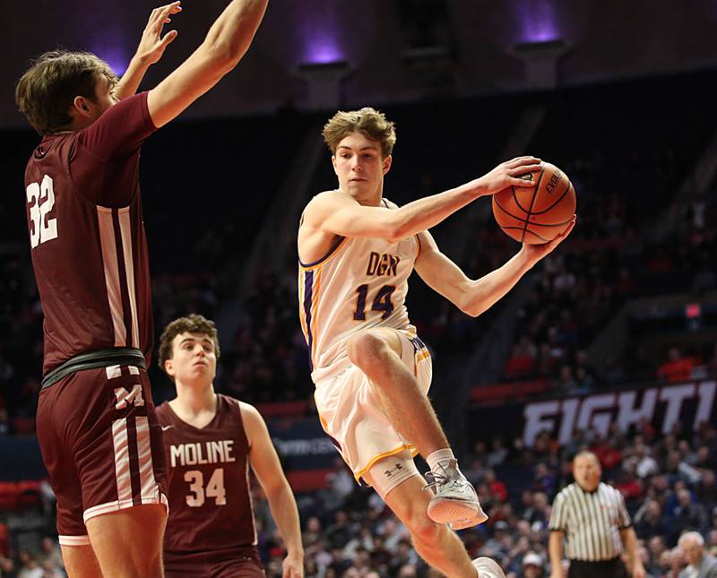 Downers Grove North's Max Haack looks to pass the ball around Downers Grove North's Henry Sevcik during the Class 4A state semifinal game on Friday, March 10, 2023 in Champaign.