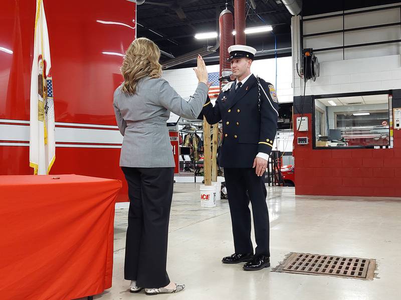 New Princeton Fire Lt. Eli Vanautreve is sworn in Monday, Feb. 5, 2024, by City Manager Theresa Wittenauer in front of colleagues, family and friends at the Princeton fire station.