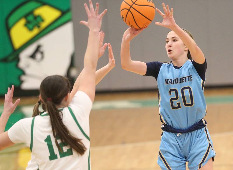 Marquette's Kaitlyn Davis shoots a jump shot over Seneca's Elsa Douglas on Thursday, Feb. 5, 2026 at Seneca High School.