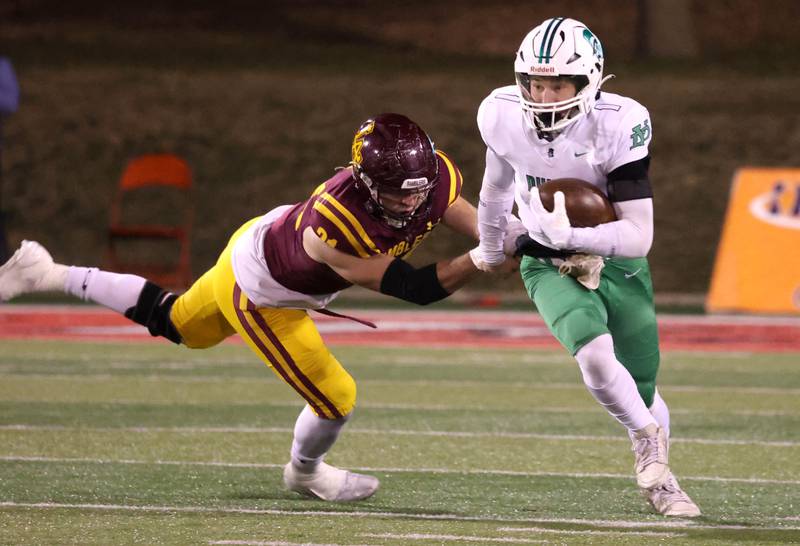 York’s Bruno Massel gets by Loyola Academy's Quinn Drehkoff during their Class 8A state championship game Saturday, Nov. 30, 2024, in Hancock Stadium at Illinois State University in Normal.