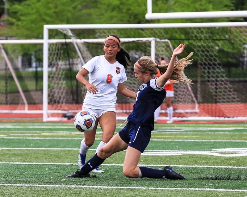 Oswego East's Anya Gulbrandsen (3) defends against Oswego's Selah Smith (6) during the Class 3A East Aurora Regional final between Oswego East vs. Oswego. May 20, 2022