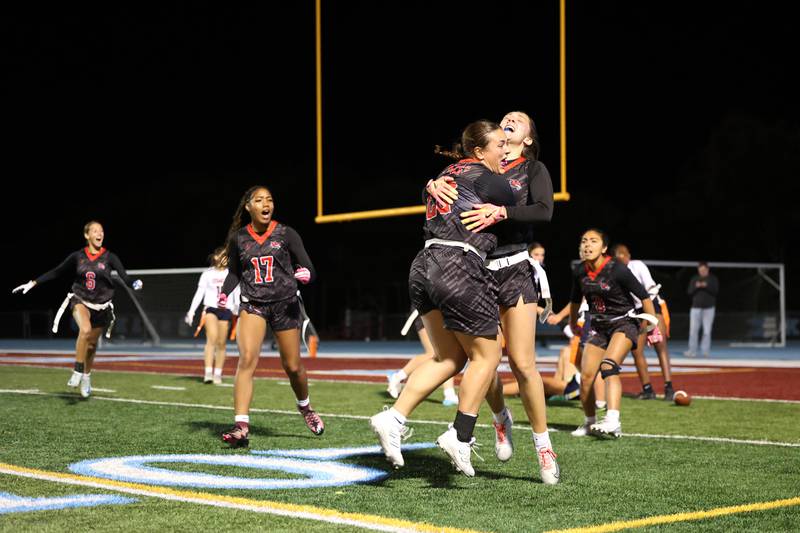 Yorkville's Kayla Kersting and Annabel West leap in celebration as the Foxes secured a 2-1 overtime victory over Oswego in the IHSA Kankakee Regional championship game on Thursday, Oct. 9, 2025.