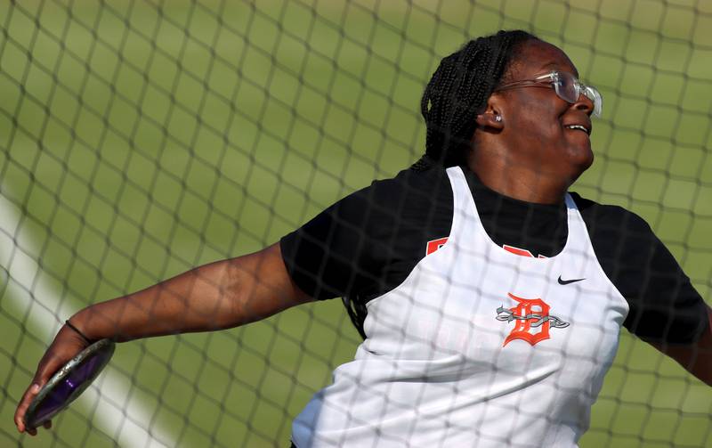DeKalb’s Chianti Johnson competes in the discus in IHSA Class 3A Girls Sectional Track and Field Meet action at Red Raider Stadium on the campus of Huntley High School in Huntley on Wednesday, May 14, 2025.