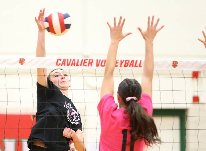Ottawa's Mary Stisser hits the ball past L-P's Anna Riva during Volley for a Cure night on Tuesday, Oct. 1, 2024 at AJ Sellett Gymnasium.