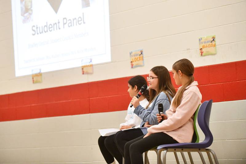 Bradley Central student council members Tatum Smith, Natalia Ruiz and Leyana Mohammad speak on the student panel Tuesday at a community stakeholder event at Bradley West Elementary.