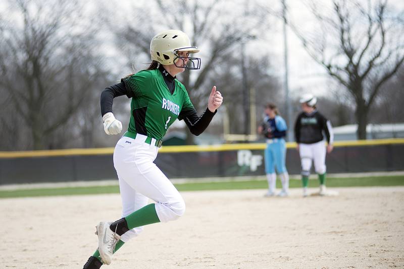 Rock Falls' Maddison Morgan comes into score Saturday, April 16, 2022 against Bureau Valley.