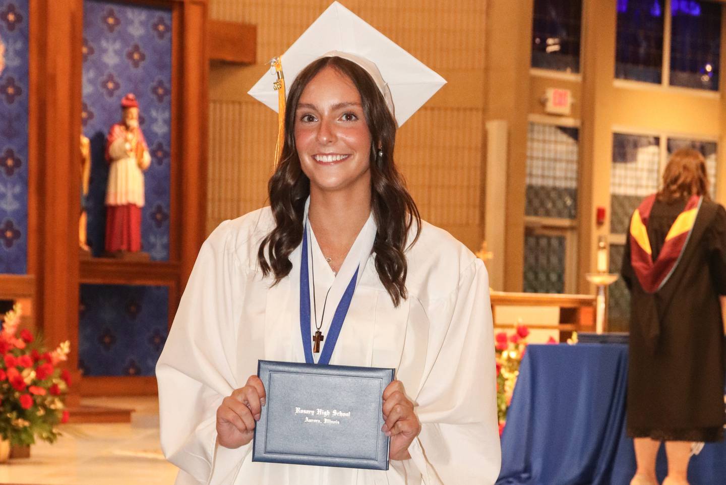 Reese Gilla of Sugar Grove was the valedictorian this year at Rosary High School in Aurora. The all-girls Catholic school will take on a new name as of July 1, 2025, Rosary College Prep.