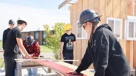 Huntley High students build their own classroom