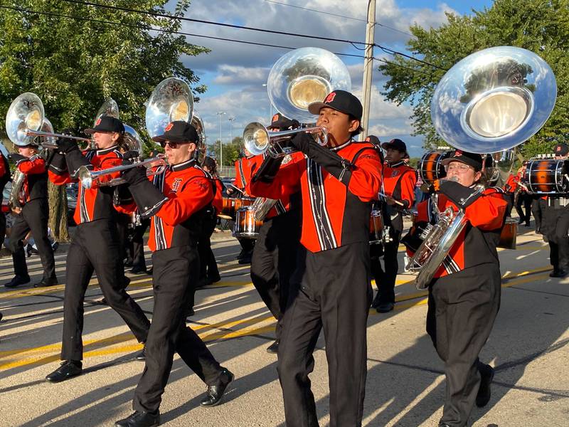 Members of the DeKalb High School Marching Band perform during the annual DeKalb High School Homecoming Parade on Wednesday, Sept. 24, 2025, along West Dresser Road.
