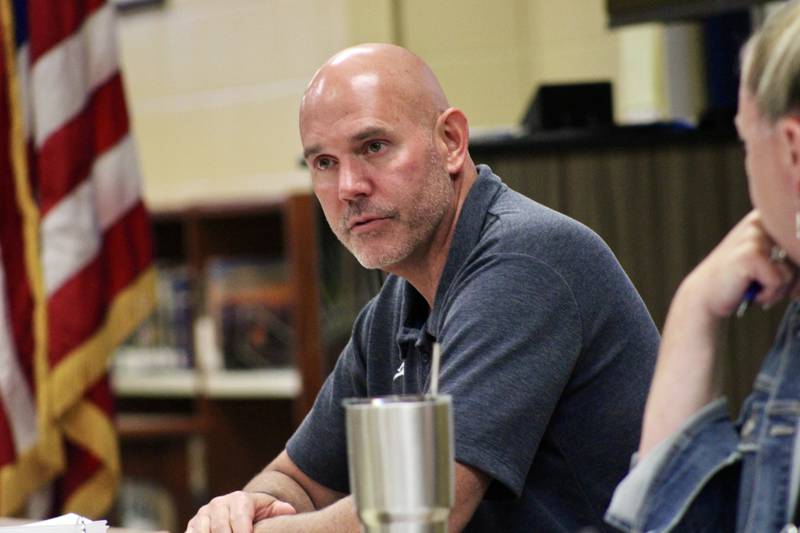 Sterling Public Schools Superintendent Tad Everett listens as the board discussions the ramifications of a recommendation to establish professional leaning communities that would require an early dismissal of classes once a week across the district.