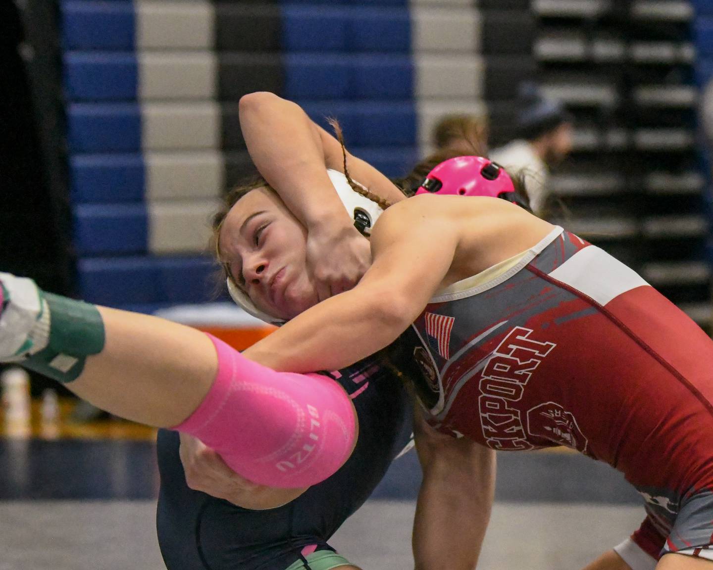 Veronica Skibicki of Lockport, right, tries to take down Eva Hermansson of Woodstock in the 110-weight class  championship match on Saturday Jan. 4, 2025, where Veronica took a 4-3 decision during the Aaron Dundley invite held at Oswego East High School.