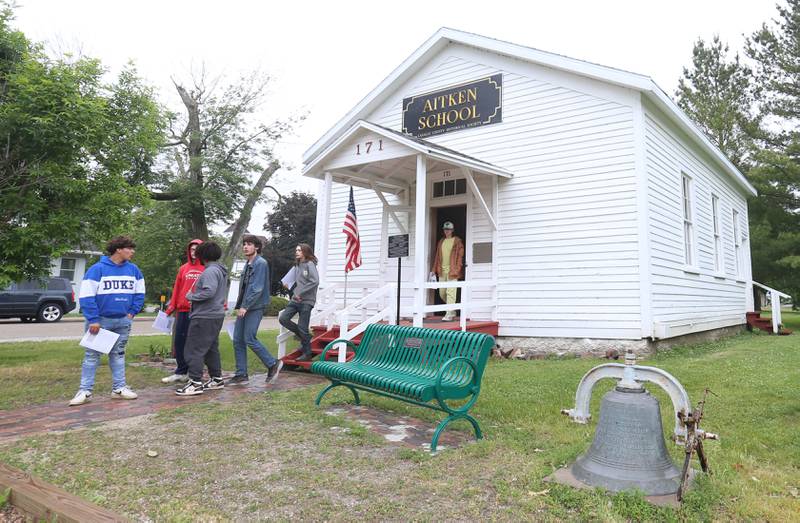 Students with the Bureau County Special Schools BEST Program exit Aitken School on Tuesday, May 20, 2025, at the La Salle County Historical Society in Utica. Aitken School is a one-room schoolhouse located on the campus of the La Salle County Historical Society. The schoolhouse was originally established as a school in a deed notarized by Horace D. Hickok, brother of "Wild Bill" Hickok on Aug. 3, 1865. The building was donated to the La Salle County Historical Society in 1990 by Unimin Corporation and relocated to its present site the same year. It has been restored and furnished by many dedicated friends of one-room schoolhouses to be used for educational purposes.