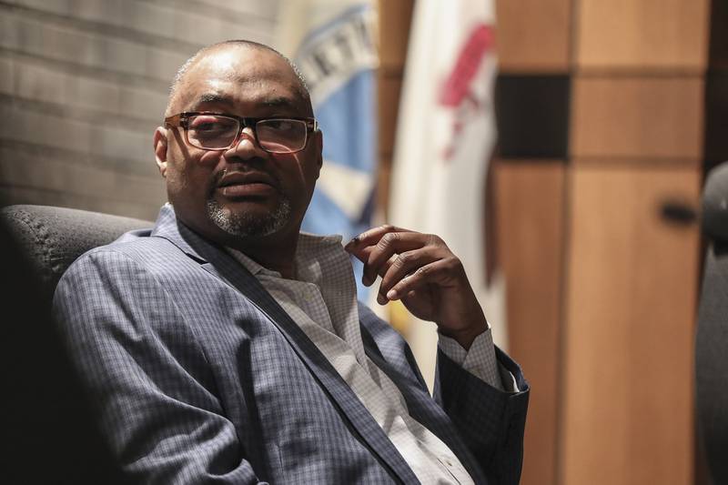 Councilman Terry Morris listens to comment by other members of the council on Wednesday, April 14, 2021, at Joliet City Hall in Joliet, Ill. Local landlords voice concerns about potential inspection fees on their properties.