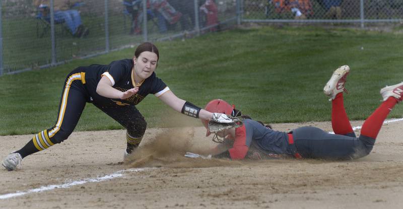 Reed Custer’s Makenzie Foote is late with the tag as Ottawa’s Maura Condon steals 3rd base in the 4th inning Friday at Ottawa.