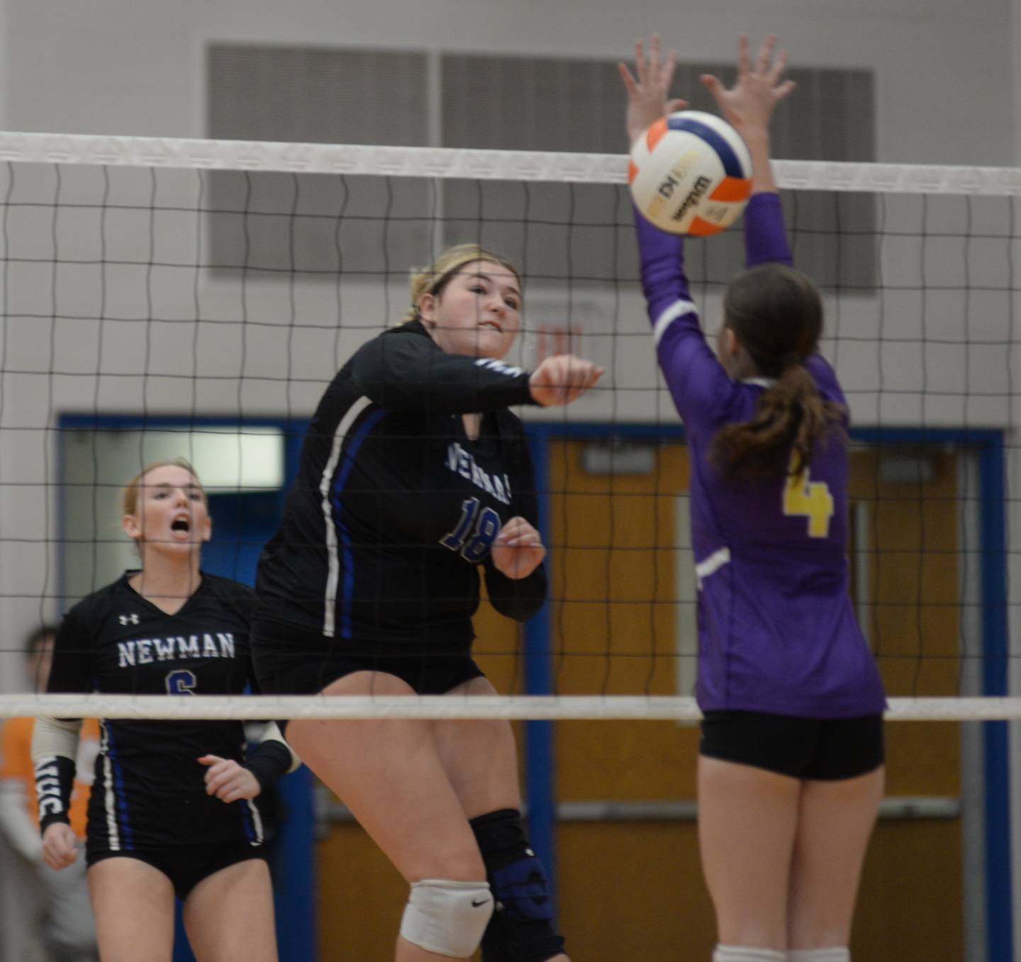 Sterling Newman's Kennedy Rowzee hits the ball past an Orangeville defender at the Linda Ludwig Memorial Volleyball Tournament held at Eastland High School in Lanark on Saturday, Oct. 14, 2023.