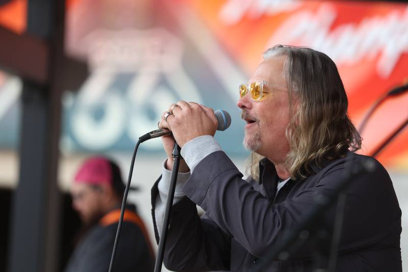 The band the BuzzBins performs at the festivities opening Joliet's City Square downtown on Friday, May 1, 2026.
