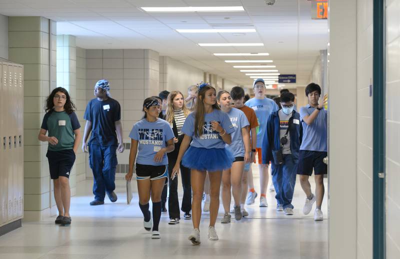 Downers Grove South High School students take a tour of the school  during Freshman orientation and Mad Dash held Saturday Aug 19, 2023.