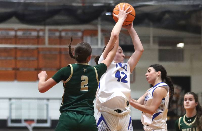 Geneva’s Adelyn Estabrook snags a rebound against Boylan in girls IHSA Class 3A Sectional basketball on Tuesday, Feb. 24, 2026, at Crystal Lake Central High School in Crystal Lake.