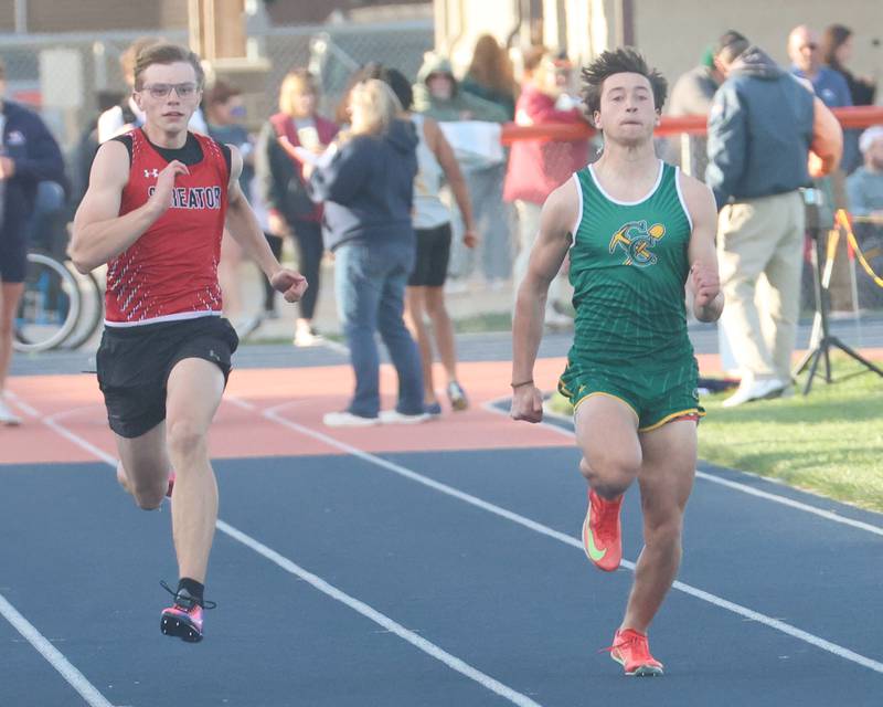 Streator's Andrew Warwick and Coal City's Ryland Clements run the 100 meter dash during the Class 2A Sectional on Wednesday, May 20, 2026 at Pontiac High School.